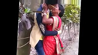 indian college couples outside garden