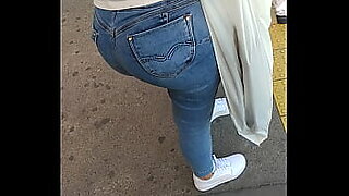 in jeans masturbating